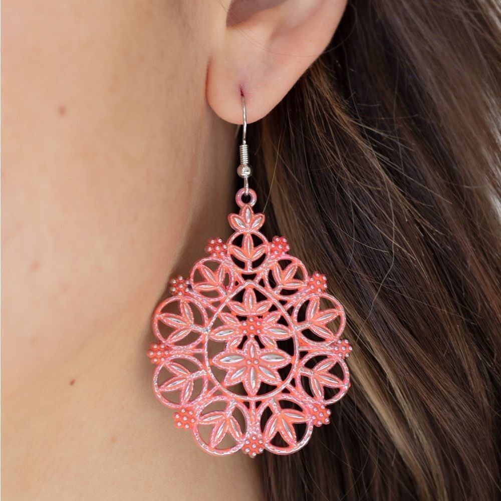 Red distressed painted metal earrings floral pattern